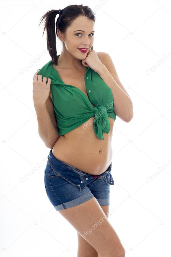 Sexy Young Pin Up Model Wearing a Green Tied Top And Blue Shorts