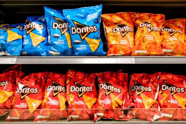 London UK, November 15 2025, Selection Of Popular Doritos Flavoured Corn Chips