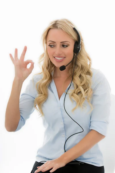 Attractive Young Business Woman Using a Telephone Headset — Stok fotoğraf