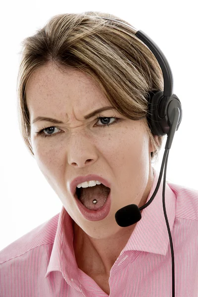 Angry Attractive Young Business Woman Using a Telephone Headset — Stock Photo, Image