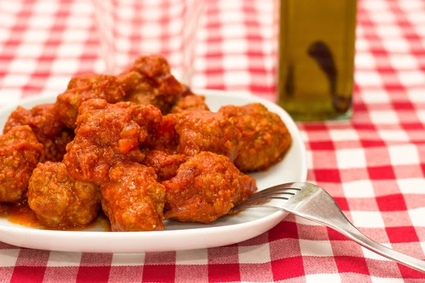 Köttbullar i tomatsås Stockbild