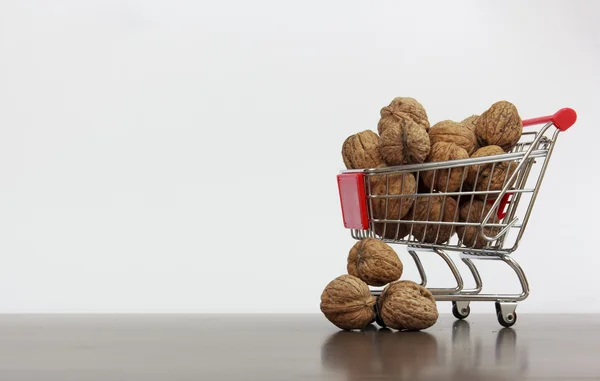 Shopping basket with nuts — Stock Photo, Image