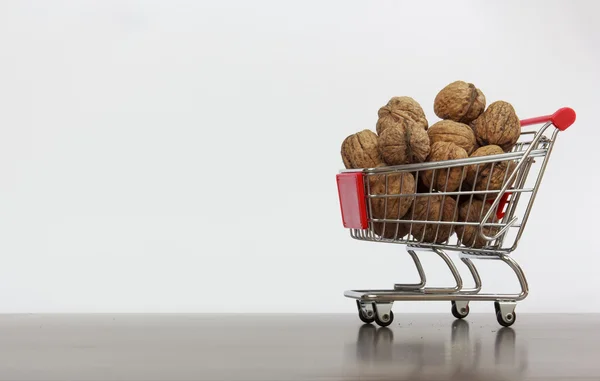 Shopping basket with nuts — Stock Photo, Image