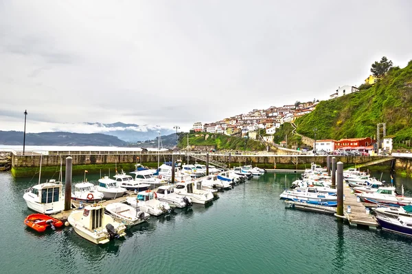 View of Lastres from harbor. It is one of the most beautiful vil Stock Photo