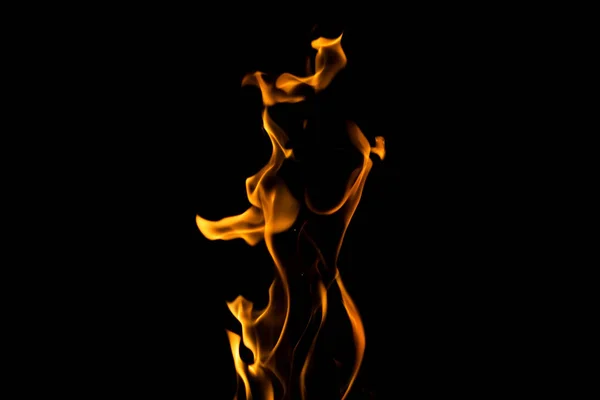 Silhouette di una ragazza da lingue di fiamma — Foto Stock