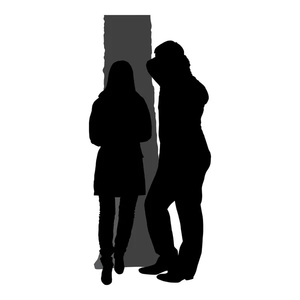 Silhouettes de couple romantique sur fond blanc — Image vectorielle
