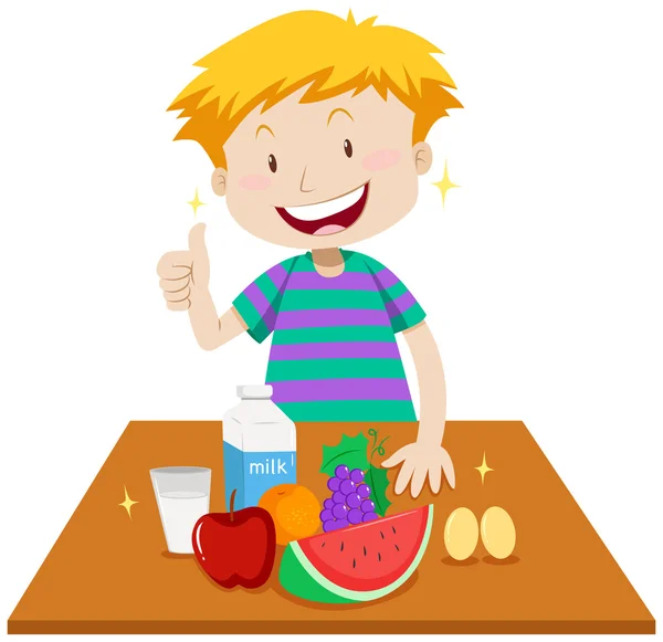 Kleine jongen en gezond voedsel op tafel — Stockvector