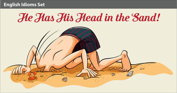 A boy putting his head in the sand