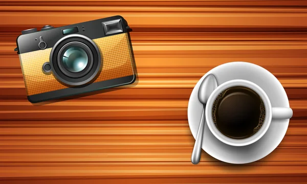 Camera en een kopje koffie op tafel — Stockvector