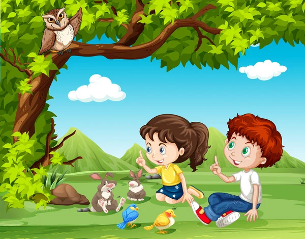 Boy and girl sitting under the tree Royalty Free Stock Vectors