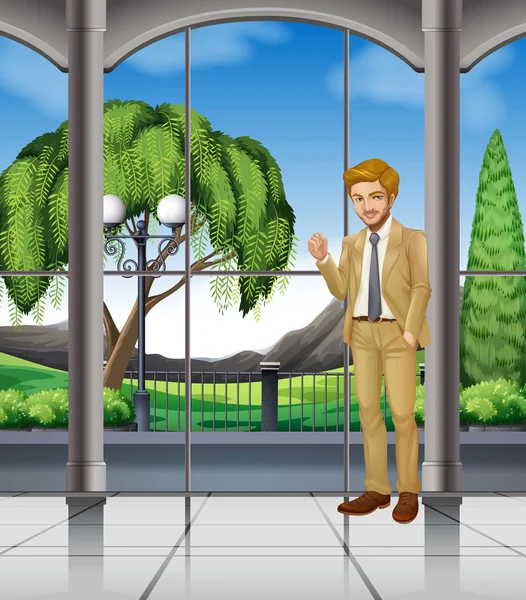 Businessman standing in the room with view — Stock Vector