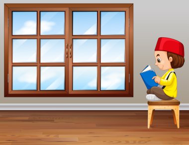 Müslüman çocuk bir kitap okuma