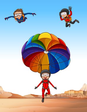 Üç kişi skydiving yaparken