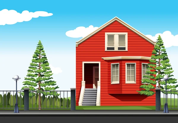 Red house by the road — Stock Vector