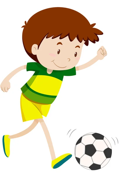 Маленький хлопчик грає у футбол — стоковий вектор