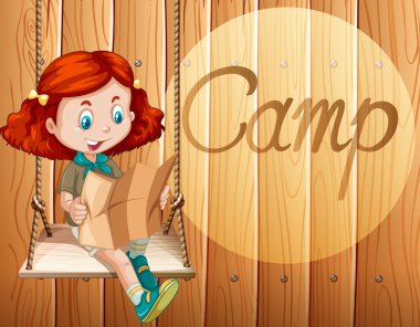 Kız bir harita okuma salıncak üzerinde