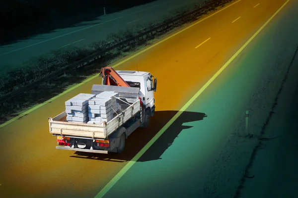 Construction truck on the road — Stock Photo, Image
