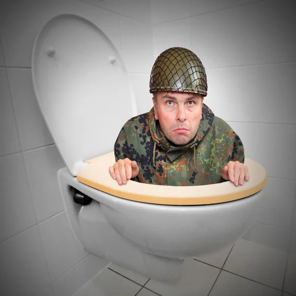 Cowardly soldier in wc. — Stock Photo, Image