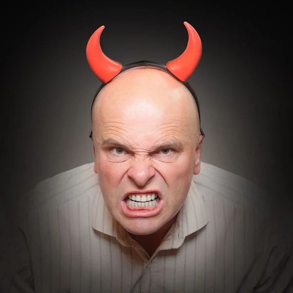 Angry man with devil horns. — Stock Photo, Image