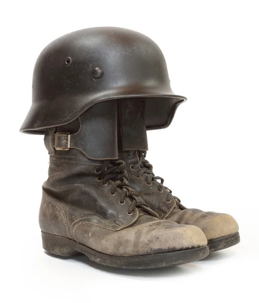 Retro military helmet and boots — Stock Photo, Image