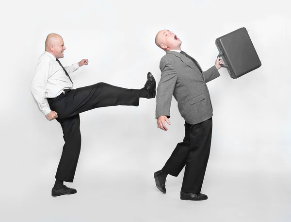 Fired businessman and angry boss — Stock Photo, Image