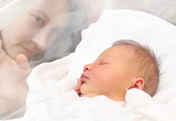 Young mother and her newborn baby girl — Stock Photo, Image