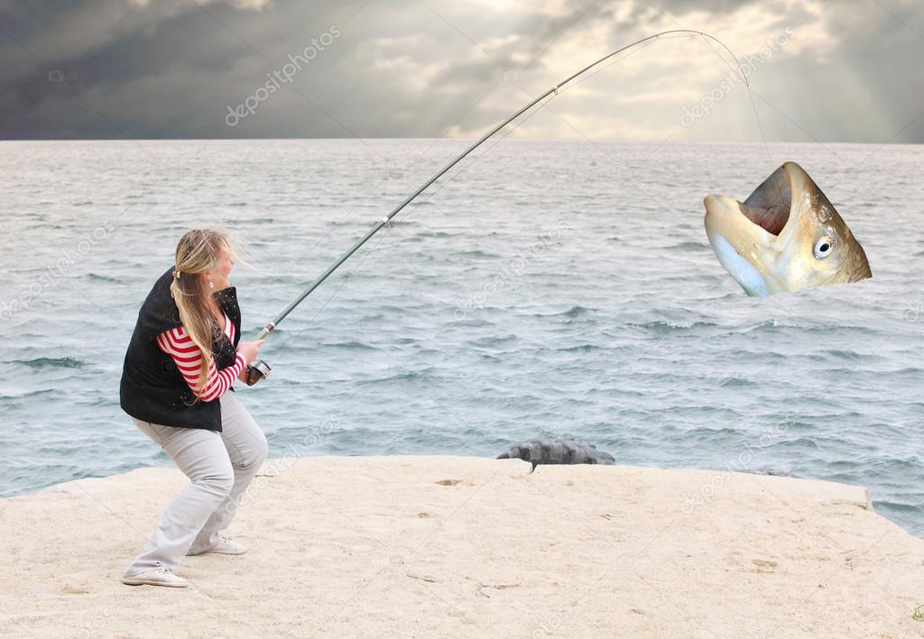 Successful angler catching big fish — Stock Photo © vladvitek #65960313