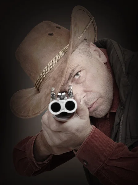 Cowboy with shotgun aiming — Stock Photo, Image