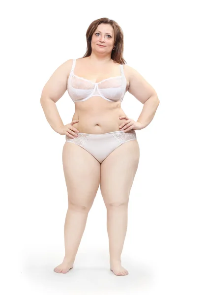 Överviktig kvinna klädd i bikini. — Stockfoto