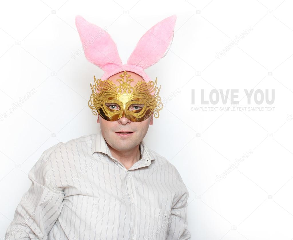 Man in love with paper mask and rabbit ears.