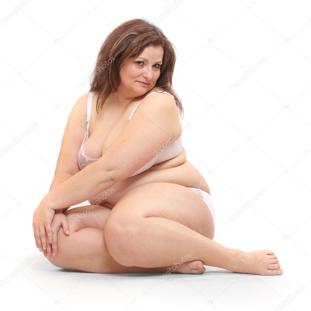 Overweight woman dressed in white underwear