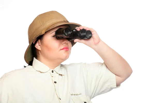 Traveler exploring looking through binoculars — Stock Photo, Image