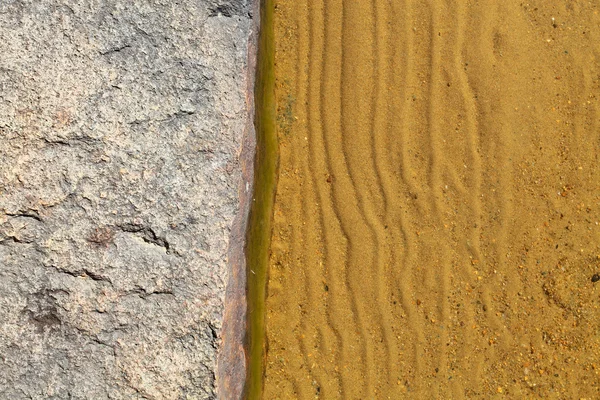 Stone and sand on the lakeside — Stock Photo, Image