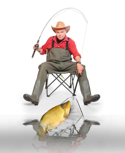 Рибалка з великою рибою — стокове фото