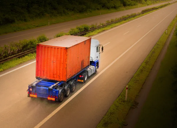 Red truck on the highway — Stock Photo, Image