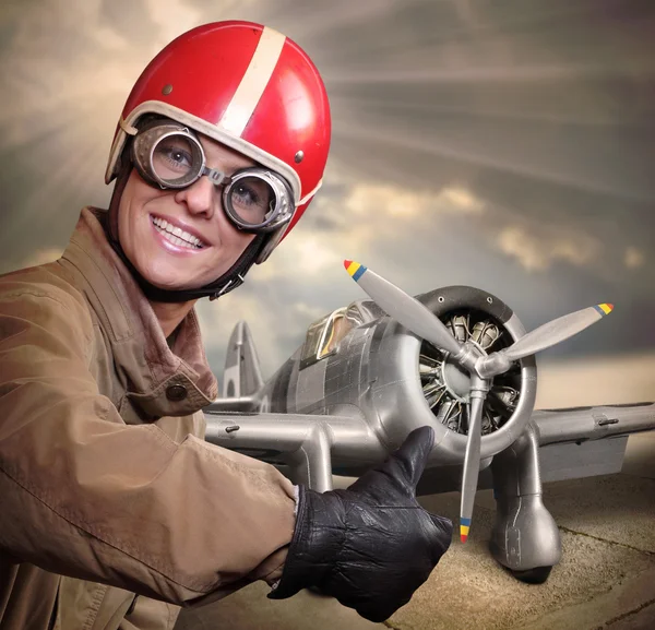 Pilot mit Retro-Jagdflugzeug. — Stockfoto