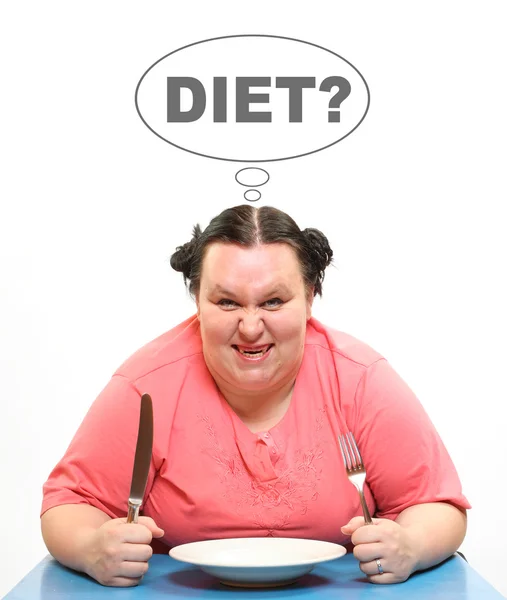 Mujer obesa hambrienta y plato vacío —  Fotos de Stock