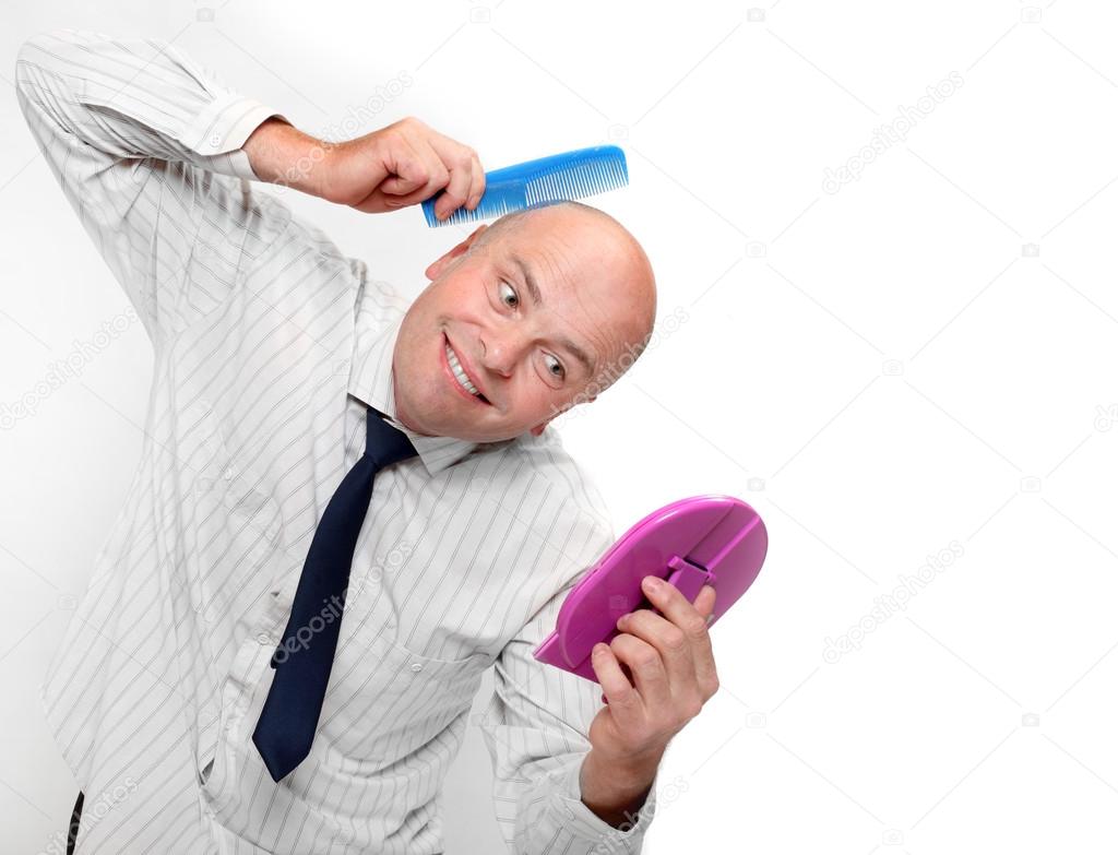 Hairless businessman with mirror