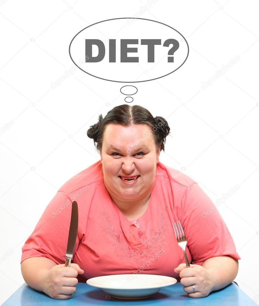 Hungry obese woman and empty plate
