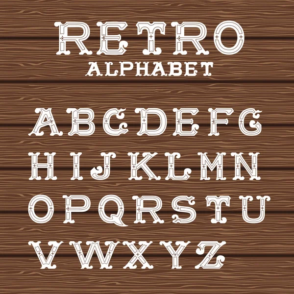 Vintage alphabet on wooden background — Stock Vector