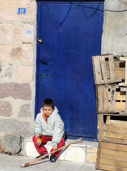Nigde Turkey January Unidentified Boy Lolipop Crackers Sitting Blue Door — Stock Photo, Image