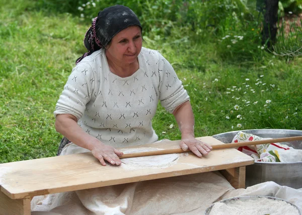 Turkish Woman making traditional Turkish bread Yufka