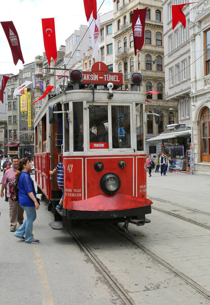 People getting on the tram at Galatasaray High School Stop