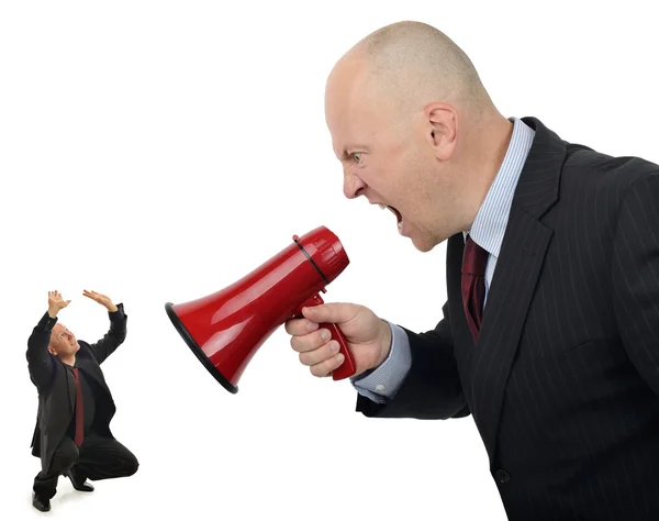 Businessman shouting orders at worker — Stock Photo, Image