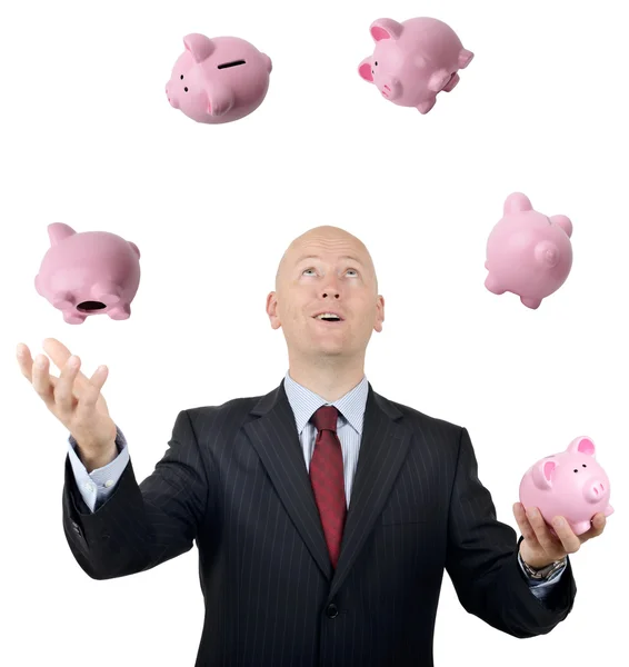 Businessman juggling money — Stock Photo, Image