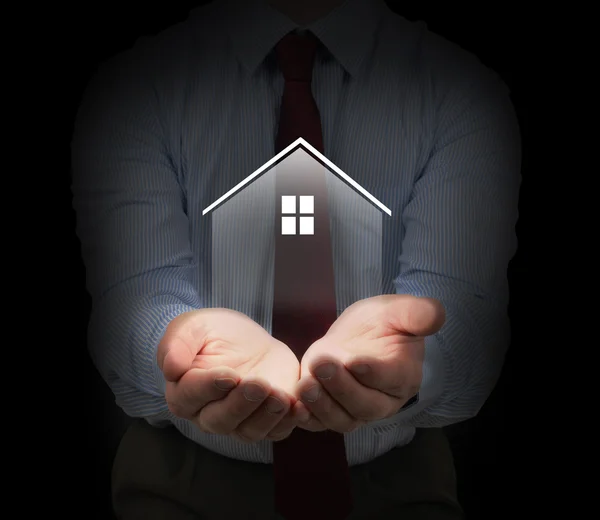 Man with house model image — Stock Photo, Image