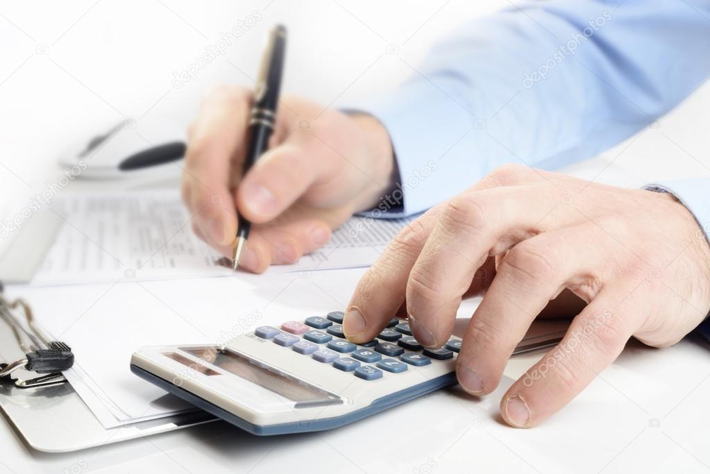 businessman with calculator