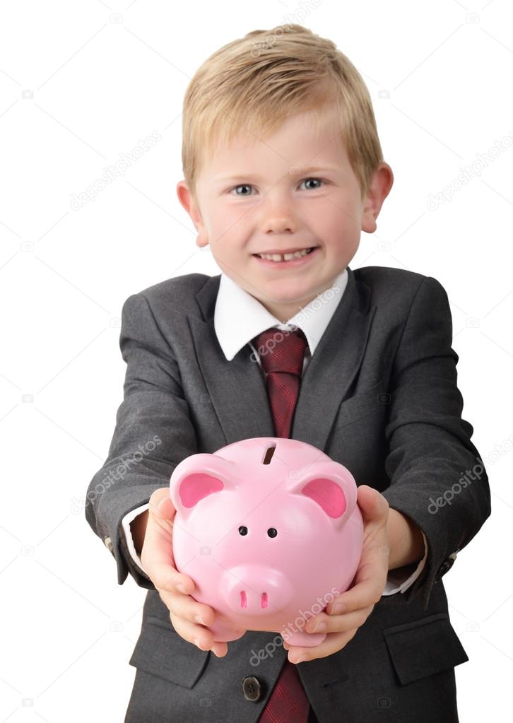 Boy holding piggybank