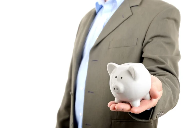 Man in suit holding piggy bank — Stock Photo, Image