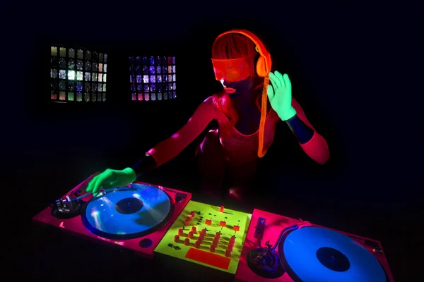 Sexy neon uv glow DJ — Stock Photo, Image